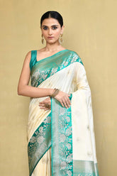 Off- White and Green Banarasi Handloom saree with Contrast Border
